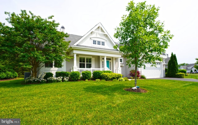 29486 Andrew Jackson Dr, Millsboro, DE 19966 - view of front of home featuring a porch, driveway, and a front yard