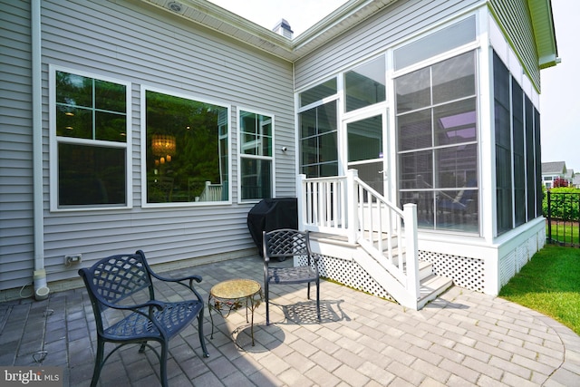 29486 Andrew Jackson Dr, Millsboro, DE 19966 - view of patio / terrace with a sunroom and a grill