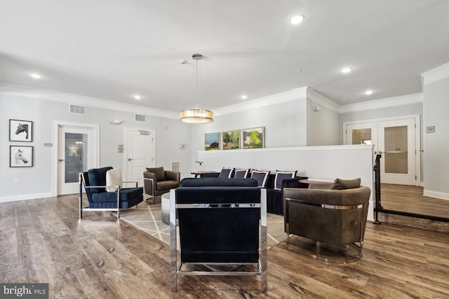 23630 Havelock Walk Ter Unit 205, Ashburn, VA 20148 - living room with crown molding, wood finished floors, recessed lighting, baseboards, and french doors