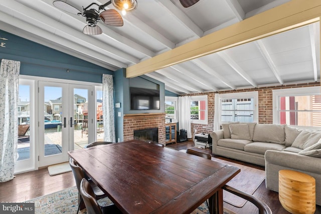68 Gregg Dr, Manahawkin, NJ 08050 - living room featuring wood finished floors, ceiling fan, french doors, a brick fireplace, and brick wall