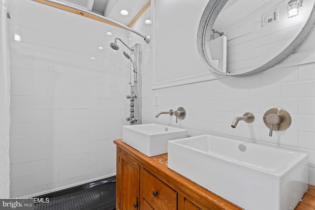 68 Gregg Dr, Manahawkin, NJ 08050 - bathroom featuring tile walls, double vanity, and a shower with shower curtain