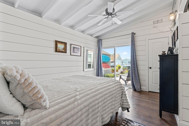 68 Gregg Dr, Manahawkin, NJ 08050 - bedroom featuring access to exterior, dark wood-style floors, and wood walls