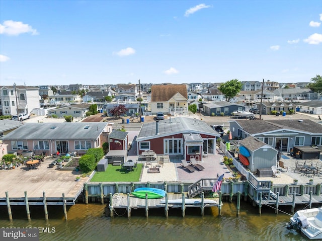 68 Gregg Dr, Manahawkin, NJ 08050 - aerial view of residential area featuring a large body of water