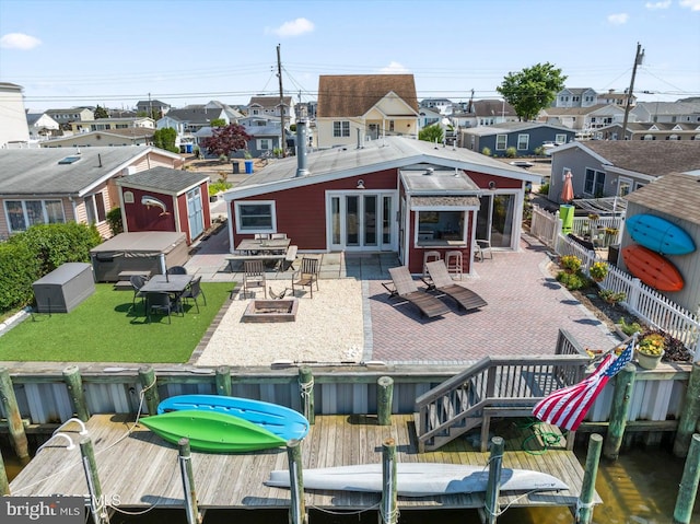68 Gregg Dr, Manahawkin, NJ 08050 - back of house with a residential view, a patio area, a wooden deck, and outdoor dining area