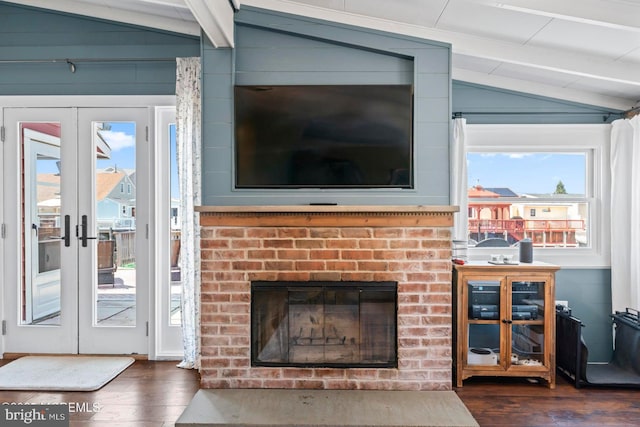 68 Gregg Dr, Manahawkin, NJ 08050 - living room featuring dark wood-style floors, a fireplace, and french doors