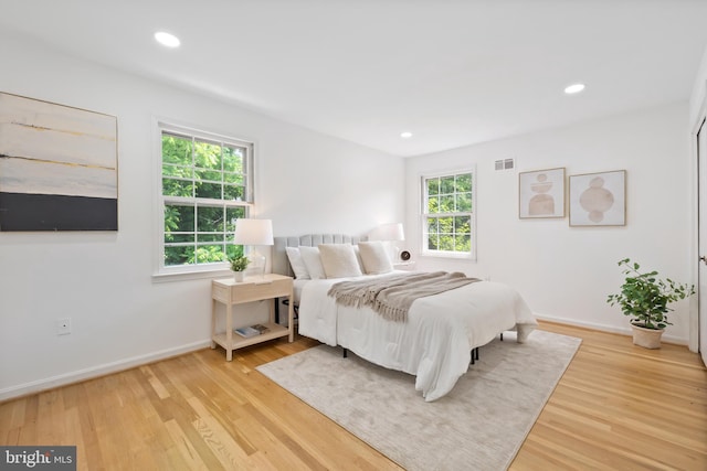 1612 Lemontree Ln, Silver Spring, MD 20904 - bedroom with light wood-style floors, baseboards, and recessed lighting