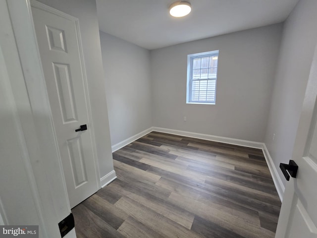 1612 Lemontree Ln, Silver Spring, MD 20904 - spare room featuring baseboards and dark wood-style floors