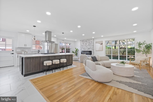 1612 Lemontree Ln, Silver Spring, MD 20904 - living room with recessed lighting and a large fireplace