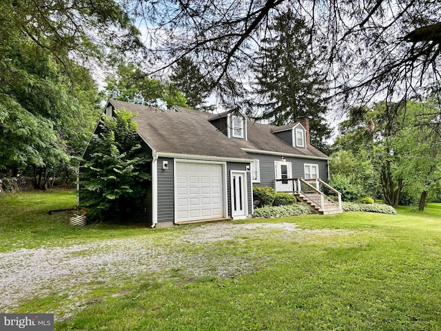 3095 Carlisle Rd, Gardners, PA 17324 - view of front of house with a front lawn, a chimney, and an attached garage
