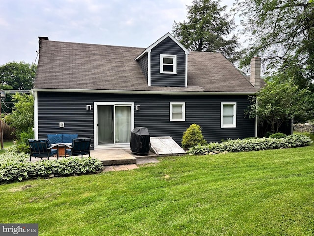 3095 Carlisle Rd, Gardners, PA 17324 - rear view of house featuring a lawn, a patio area, an outdoor hangout area, a chimney, and a shingled roof
