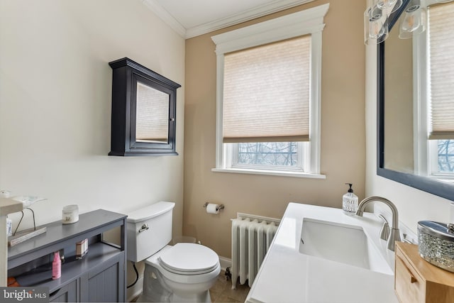 1 S Bartram Ave Unit 3, Atlantic City, NJ 08401 - bathroom featuring radiator, vanity, toilet, ornamental molding, and tile patterned flooring