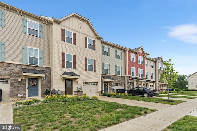 326 Iannelli Rd, Clarksboro, NJ 08020 - townhome / multi-family property with a residential view, stone siding, concrete driveway, board and batten siding, and a garage