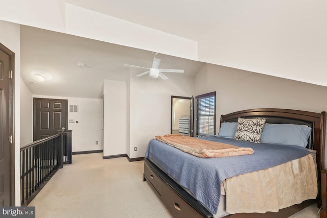 8861 Ashgrove House Ln, Vienna, VA 22182 - bedroom featuring light carpet, lofted ceiling, baseboards, and a ceiling fan