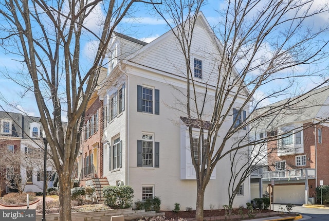 8861 Ashgrove House Ln, Vienna, VA 22182 - view of side of home with brick siding