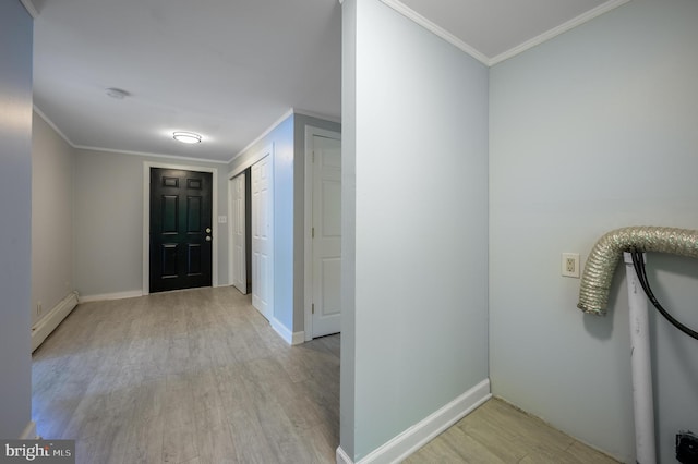 624 Hunt Ave, Trenton, NJ 08610 - hallway featuring baseboard heating, ornamental molding, wood finished floors, and baseboards