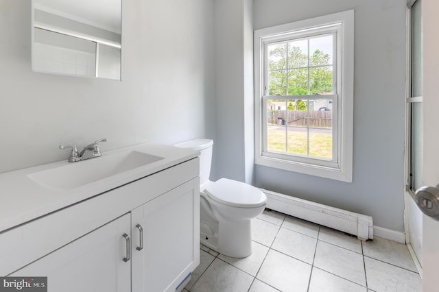 624 Hunt Ave, Trenton, NJ 08610 - bathroom with vanity, a baseboard radiator, toilet, tile patterned floors, and baseboards