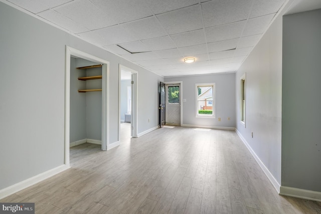 624 Hunt Ave, Trenton, NJ 08610 - empty room with a paneled ceiling, wood finished floors, and baseboards