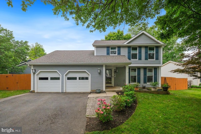 11636 Doxdam Ter, Germantown, MD 20876 - traditional home with a garage, driveway, and roof with shingles