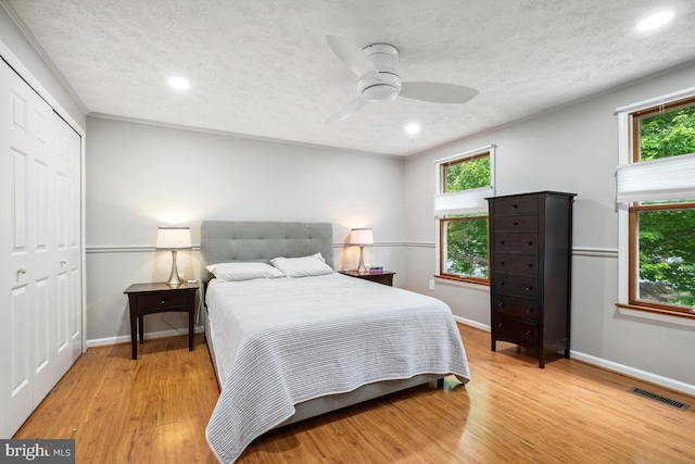 11636 Doxdam Ter, Germantown, MD 20876 - bedroom featuring baseboards, recessed lighting, light wood-type flooring, a closet, and ceiling fan