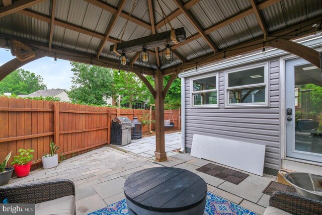 11636 Doxdam Ter, Germantown, MD 20876 - fenced backyard with a gazebo, a grill, and a patio