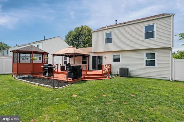 123 E Violette Dr, New Castle, DE 19720 - back of property featuring a gazebo, central AC unit, and a wooden deck
