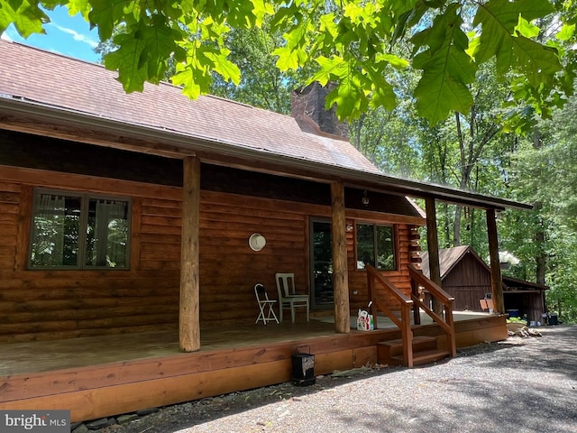 11882 Bumbarger Cir, Petersburg, PA 16669 - entrance to property featuring a chimney