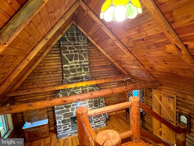 11882 Bumbarger Cir, Petersburg, PA 16669 - interior space featuring wooden ceiling, log walls, hardwood / wood-style floors, and an upstairs landing