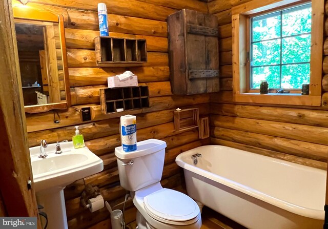 11882 Bumbarger Cir, Petersburg, PA 16669 - bathroom featuring a freestanding bath and rustic walls