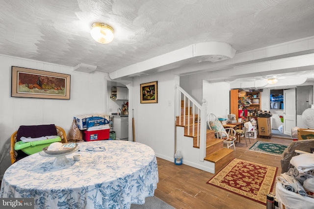 5409 20th Ave, Hyattsville, MD 20782 - dining area featuring stairs, wood finished floors, and baseboards