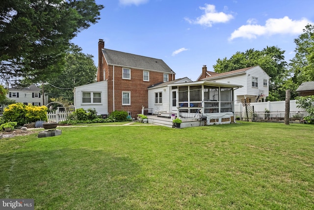 5409 20th Ave, Hyattsville, MD 20782 - rear view of property with a sunroom and a chimney
