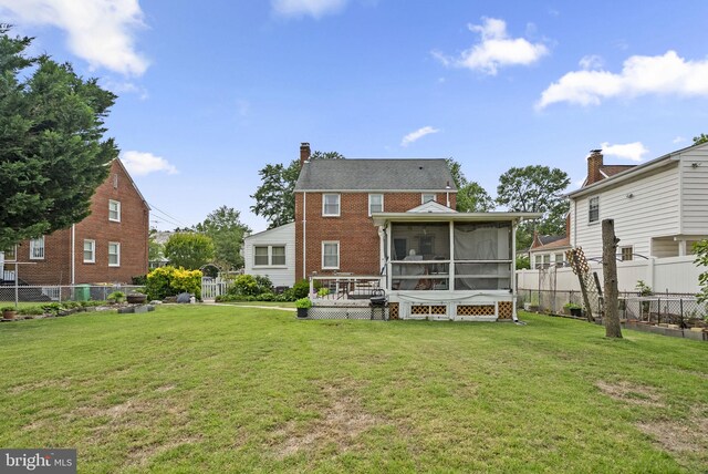 5409 20th Ave, Hyattsville, MD 20782 - back of house with a sunroom, brick siding, and a chimney
