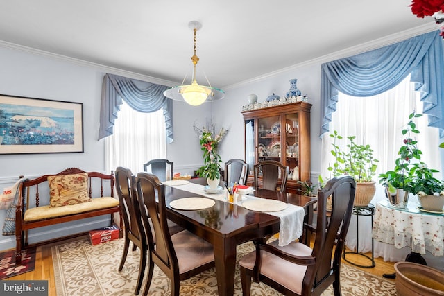 5409 20th Ave, Hyattsville, MD 20782 - dining space with light wood finished floors and ornamental molding