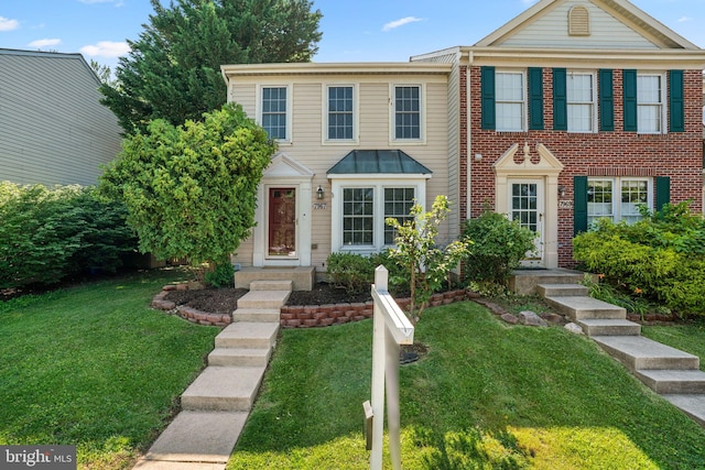 7967 Brightmeadow Ct, Ellicott City, MD 21043 - view of front facade with a front lawn