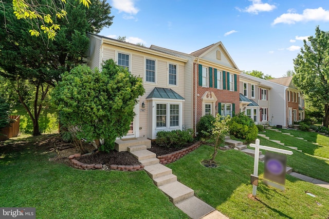 7967 Brightmeadow Ct, Ellicott City, MD 21043 - view of front of house with a front lawn