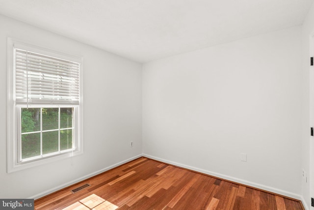 7967 Brightmeadow Ct, Ellicott City, MD 21043 - spare room featuring baseboards and wood finished floors