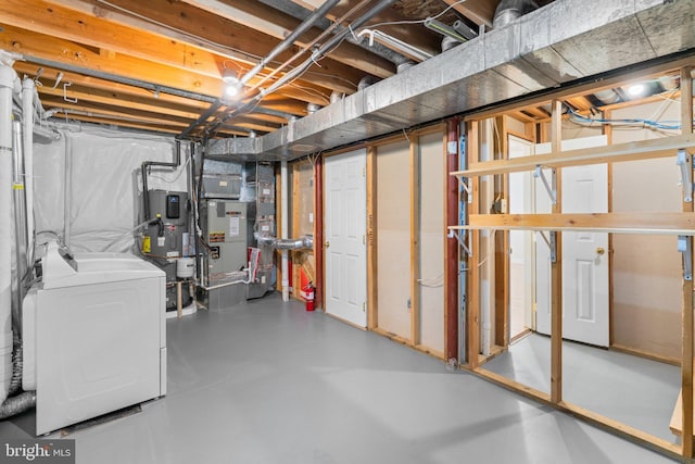 7967 Brightmeadow Ct, Ellicott City, MD 21043 - unfinished below grade area featuring heat pump water heater, heating unit, and washer and dryer