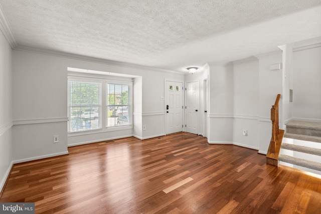 7967 Brightmeadow Ct, Ellicott City, MD 21043 - unfurnished living room with wood finished floors, a textured ceiling, stairway, and crown molding