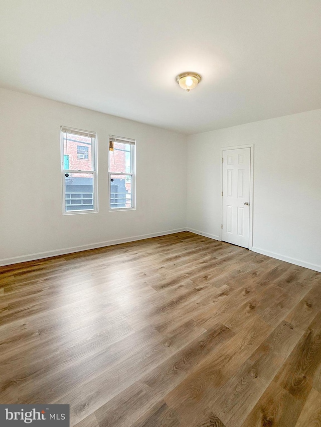 1308 Gallaudet St NE, Washington, DC 20002 - unfurnished room with wood finished floors and baseboards