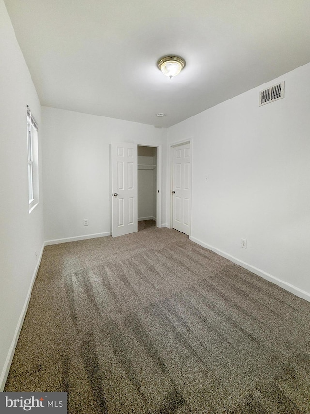 1308 Gallaudet St NE, Washington, DC 20002 - unfurnished bedroom with carpet and a closet