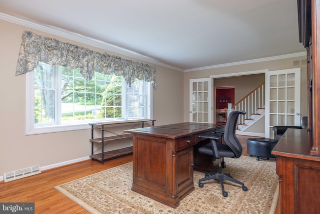 17 Bridleshire Rd, Newark, DE 19711 - home office with ornamental molding, wood finished floors, french doors, and baseboards