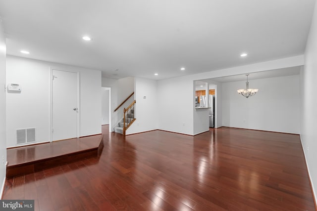 9 Alpen Green Ct Unit 20-208, Burtonsville, MD 20866 - below grade area featuring a chandelier, wood-type flooring, stairs, recessed lighting, and freestanding refrigerator