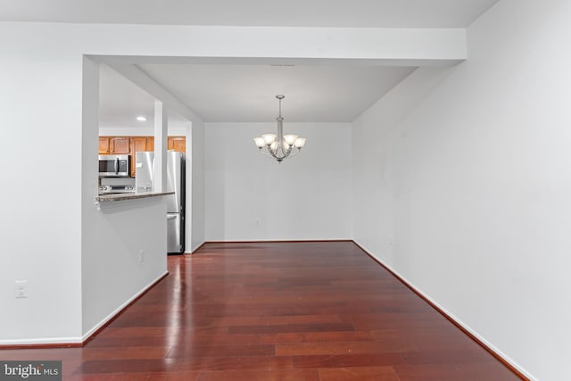 9 Alpen Green Ct Unit 20-208, Burtonsville, MD 20866 - unfurnished dining area with dark wood finished floors, a chandelier, recessed lighting, and baseboards