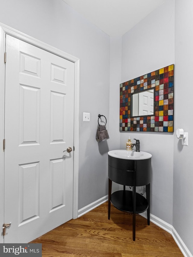 928 Township Line Rd, Chalfont, PA 18914 - bathroom with baseboards and wood finished floors