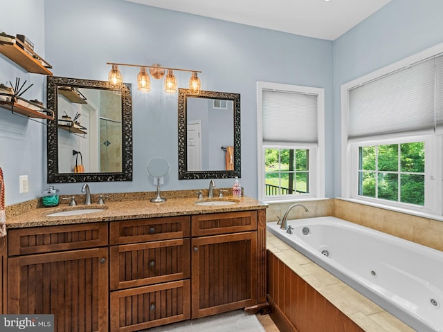 928 Township Line Rd, Chalfont, PA 18914 - bathroom featuring a tub with jets and double vanity