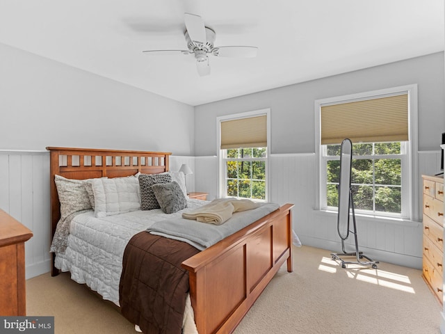 928 Township Line Rd, Chalfont, PA 18914 - bedroom featuring a wainscoted wall, light carpet, and ceiling fan