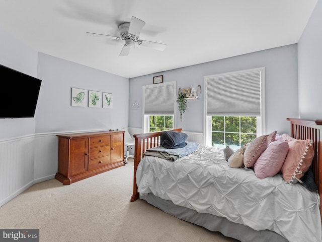 928 Township Line Rd, Chalfont, PA 18914 - carpeted bedroom featuring wainscoting and ceiling fan