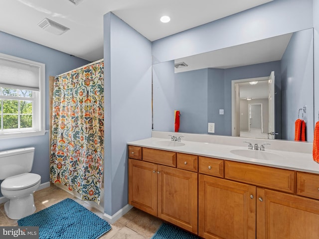 928 Township Line Rd, Chalfont, PA 18914 - full bath featuring double vanity, a shower with shower curtain, and tile patterned flooring