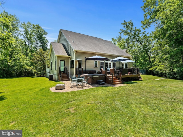 928 Township Line Rd, Chalfont, PA 18914 - back of property with a hot tub, a patio area, a yard, a deck, and a shingled roof