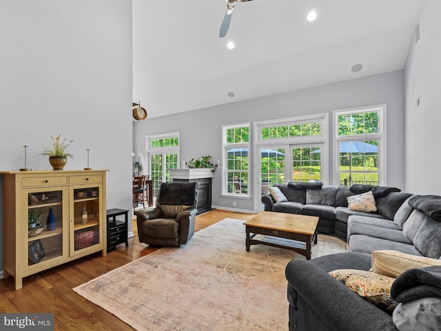 928 Township Line Rd, Chalfont, PA 18914 - living area with a ceiling fan, wood finished floors, a fireplace, recessed lighting, and high vaulted ceiling