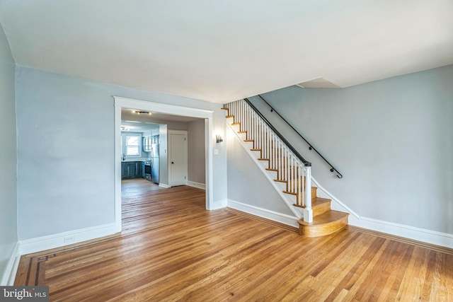 1004 N 67th St, Philadelphia, PA 19151 - stairway featuring wood finished floors and baseboards